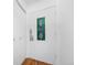 The front door has a stained glass window and hardwood floors with coat closet at 1350 Josephine St # 508, Denver, CO 80206