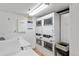 Functional laundry room with multiple washer and dryer units for convenience at 1350 Josephine St # 508, Denver, CO 80206