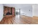 Spacious living room with hardwood floors, brick fireplace and sliding glass doors to balcony at 1350 Josephine St # 508, Denver, CO 80206