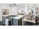 Modern kitchen with stainless steel appliances and an island at 1615 Julian St # 102, Denver, CO 80204