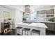 Modern kitchen with stainless steel appliances and an island at 1615 Julian St # 102, Denver, CO 80204