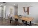 Elegant dining room featuring a wood table and modern chairs at 25146 E 1St Ave, Aurora, CO 80018