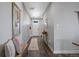 Inviting entryway with wood flooring and a built-in bench at 25146 E 1St Ave, Aurora, CO 80018