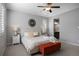 Main bedroom with ensuite bathroom and ceiling fan at 25146 E 1St Ave, Aurora, CO 80018