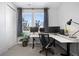 Spacious home office with a large desk and two monitors at 25146 E 1St Ave, Aurora, CO 80018