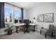 Home office with corner desk, two monitors and comfortable chair at 25146 E 1St Ave, Aurora, CO 80018