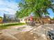 Spacious backyard with patio, perfect for outdoor dining and entertaining at 7751 Niagara St, Commerce City, CO 80022