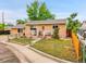 Charming single-Gathering home featuring a fenced yard and inviting front porch at 7751 Niagara St, Commerce City, CO 80022