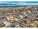 Aerial view of a neighborhood and a lake, showcasing the community setting and nearby water feature at 8965 Jellison Ct, Broomfield, CO 80021