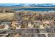 Desirable neighborhood with mountain views and a lake, showcasing the serene setting and community feel at 8965 Jellison Ct, Broomfield, CO 80021