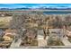 Aerial view featuring a residential neighborhood near a lake, highlighting the location and community feel at 8965 Jellison Ct, Broomfield, CO 80021