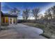 Large concrete patio, adjacent to the sunroom, enhances this private backyard at 8965 Jellison Ct, Broomfield, CO 80021