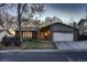 Charming brick home with attached garage, mature trees and landscaping at 8965 Jellison Ct, Broomfield, CO 80021