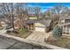 Charming single-story home with an attached garage, well-kept lawn, and brick accents at 8965 Jellison Ct, Broomfield, CO 80021