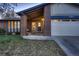 Charming brick home with well-maintained lawn and a covered front entrance, perfect for a welcoming first impression at 8965 Jellison Ct, Broomfield, CO 80021