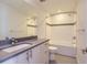 Bright bathroom with modern finishes, featuring a tiled shower and sleek vanity at 1840 Irving St, Denver, CO 80204
