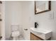 Modern half bathroom with sleek fixtures, stylish vanity, and elegant design at 1272 Bluebird St, Brighton, CO 80601