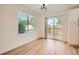 Bright dining area boasts new floors, neutral paint, and access to the back patio at 1272 Bluebird St, Brighton, CO 80601