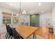 Bright dining room features natural light, sleek lighting fixture, and stylish decor at 1738 S Franklin St, Denver, CO 80210