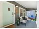 Inviting front porch with seating area, light-blue door, and house number displayed at 1738 S Franklin St, Denver, CO 80210