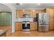 Updated kitchen featuring stainless steel appliances and sleek countertops at 1738 S Franklin St, Denver, CO 80210