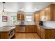 Bright kitchen with stainless appliances, lots of counter space and natural lighting at 1738 S Franklin St, Denver, CO 80210