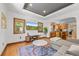 Relaxing living room with a view into the stylish and well equipped kitchen at 1738 S Franklin St, Denver, CO 80210