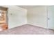 Bedroom features neutral walls, carpet, access to a private bath and a closet at 2152 Grant St, Longmont, CO 80501