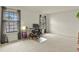 Bright home office with natural light, workspace, and neutral carpet, creating a comfortable atmosphere for productivity at 10310 E Jewell Ave # 55, Aurora, CO 80247
