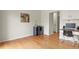 Hardwood floors highlight this work space with white cabinets and a desk at 10310 E Jewell Ave # 55, Aurora, CO 80247
