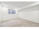 Unfurnished basement room with carpeting and a small window at 2427 S Eldridge Ct, Lakewood, CO 80228