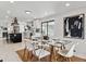 Dining room overlooking open kitchen at 2427 S Eldridge Ct, Lakewood, CO 80228