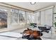 Bright sunroom featuring two chairs and a sun-filled view at 2427 S Eldridge Ct, Lakewood, CO 80228