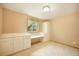 Bright bedroom features built-in storage and desk space for convenience at 1590 Longview Cir, Monument, CO 80132