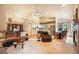 Open-concept living area featuring vaulted ceilings, hardwood floors, and an inviting layout for entertaining at 1590 Longview Cir, Monument, CO 80132