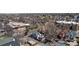 An overhead view that showcases the neighborhood, including the house, mature trees and nearby buildings at 1922 E 18Th Ave, Denver, CO 80206