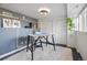 Finished basement space with a desk and chair, accented by stylish artwork and decor at 1922 E 18Th Ave, Denver, CO 80206