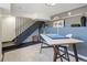 Finished basement featuring a desk and stairs leading to other levels at 1922 E 18Th Ave, Denver, CO 80206
