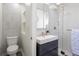 Modern bathroom featuring clean lines, sleek fixtures, and a glass-enclosed shower for a spa-like experience at 1922 E 18Th Ave, Denver, CO 80206