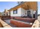 Striking exterior view of the property with brick planters and a modern white facade at 1922 E 18Th Ave, Denver, CO 80206