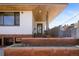 Elegant front entrance of the home with a covered porch and sleek architectural details at 1922 E 18Th Ave, Denver, CO 80206