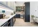Sleek kitchen featuring modern cabinetry, stainless steel appliances, and a functional layout at 1922 E 18Th Ave, Denver, CO 80206