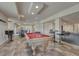 Spacious basement featuring a pool table and seating area at 580 Eagle Nest Ct, Golden, CO 80401