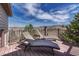Outdoor deck with lounge chairs offers views of the surrounding community at 580 Eagle Nest Ct, Golden, CO 80401