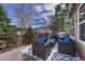 Outdoor deck with comfortable seating and a scenic view of the surrounding landscape at 580 Eagle Nest Ct, Golden, CO 80401