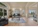 Bright living room with hardwood floors, vaulted ceilings, and large windows offering scenic views at 580 Eagle Nest Ct, Golden, CO 80401