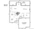 Main level floor plan includes a three car garage, kitchen, dining room, and living room at 580 Eagle Nest Ct, Golden, CO 80401