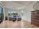 Cozy sitting area with comfortable furniture, bright windows and hardwood floors at 580 Eagle Nest Ct, Golden, CO 80401