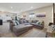 Spacious living room with a large sectional sofa, open to dining and entryway at 6760 Meade Cir # C, Westminster, CO 80030