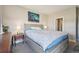 Comfortable bedroom with a calming color palette, soft carpet, and ambient bedside lighting at 6760 Meade Cir # C, Westminster, CO 80030